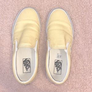 Pastel yellow slip on vans